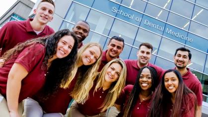 group of students in red shirts